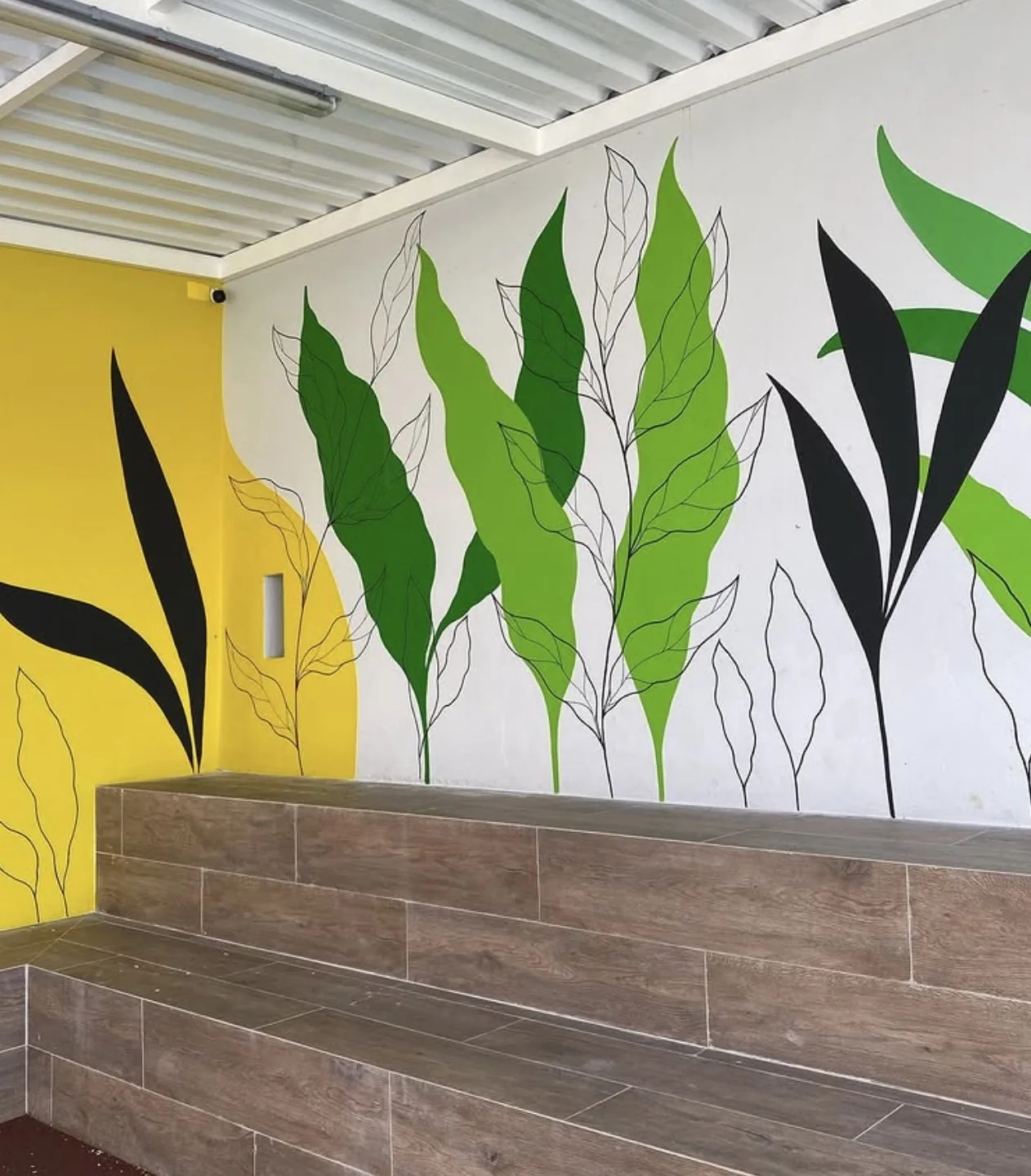 Cafe mural — tropical leaves